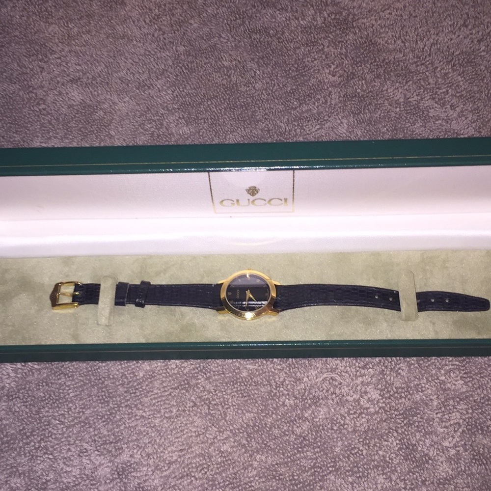 Gucci watch from Saks Fifth Ave.